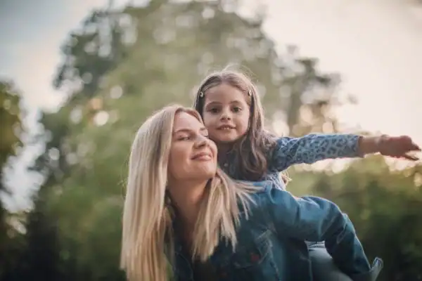 happy mum and daughter following mediation to resolve parental alienation Devon